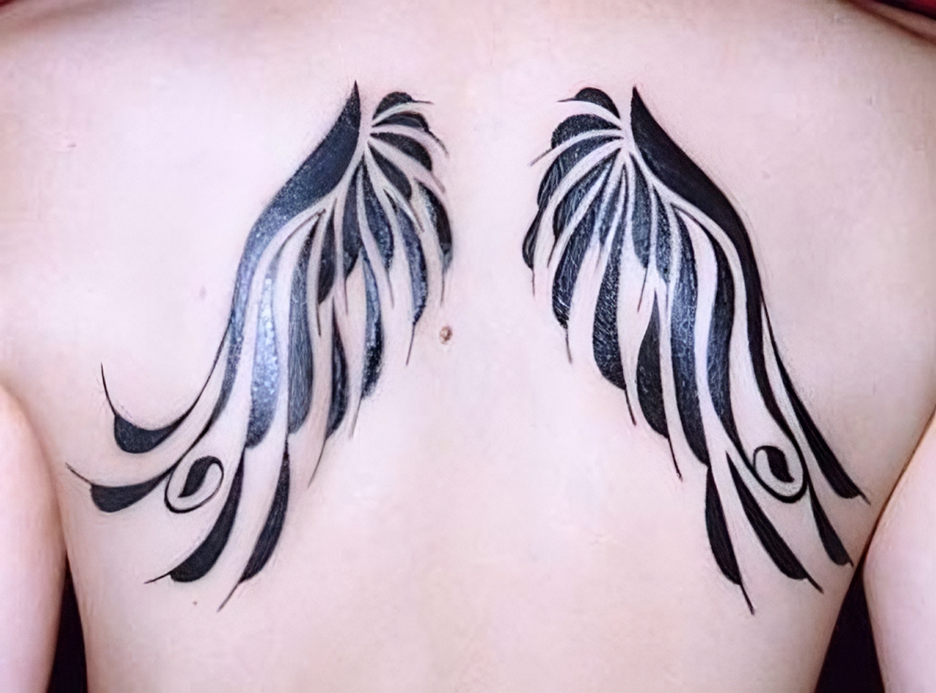Flügel Tattoo