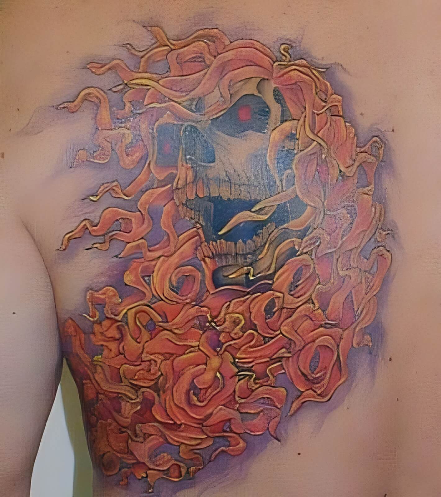 Totenkopf mit glühenden Augen und Flammenschwall Totenkopf mit glühenden Augen und Flammenschwall
